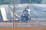 Salman Khan snapped with Sajid Nadiadwala on a bike at his Panvel farm on his bday on 27th Dec 2013